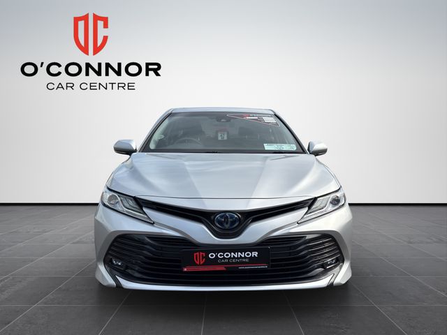 Image for 2018 Toyota Camry Looks like luxury, sips fuel like a hybrid — that's the Camry way.