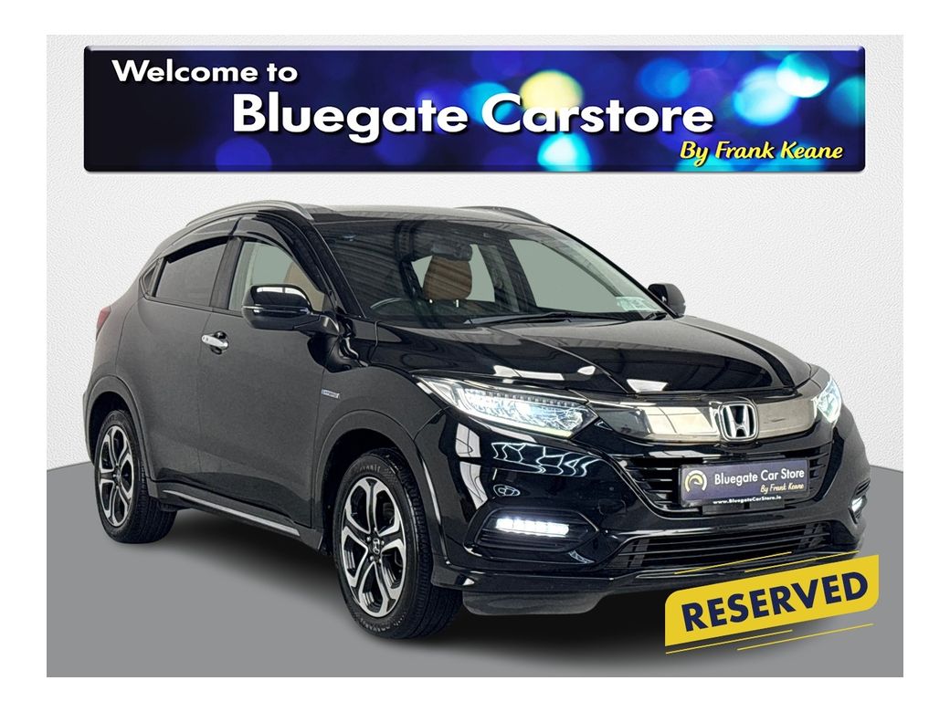 Image for 2019 Honda Vezel HEATED HALF LEATHER BROWN SEATS**HEATED WINDSHIELD**TOUCHSCREEN MEDIA**APPLE CAR PLAY**REVERSE CAMERA**PARKING SENSORS**DUAL CLIMATE**MULTIFUNCTIONAL STEERING WHEEL**LANE ASSIST**CRUISE CONTROL**