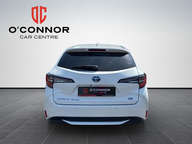Image for 2023 Toyota Corolla Carries everything. except high fuel bills.