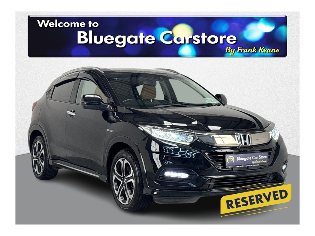 Image for 2019 Honda Vezel HEATED HALF LEATHER BROWN SEATS**HEATED WINDSHIELD**TOUCHSCREEN MEDIA**APPLE CAR PLAY**REVERSE CAMERA**PARKING SENSORS**DUAL CLIMATE**MULTIFUNCTIONAL STEERING WHEEL**LANE ASSIST**CRUISE CONTROL**