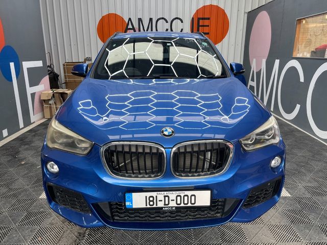 Image for 2018 BMW X1 2018 BMW X1 SDRIV18I M SPOILER AUTOMATIC/ PADDLE SHIFTERS/ PARKING CAMERA/ CRUISE CONTROL/ AMBIENT LIGHTS AND MORE