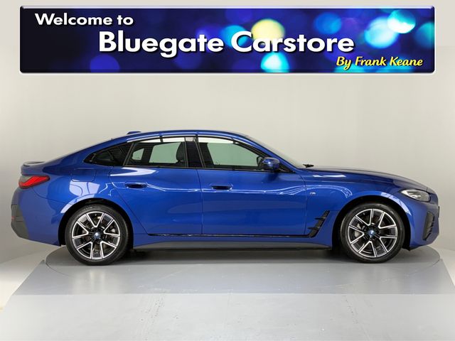Image for 2022 BMW i4 EDRIVE40 M SPORT **LEATHER HEATED SEATS**MULTIFUNCTIONAL STEERING WHEEL**FULL DIGITAL DASH**CRUISE CONTROL**APPLE CAR PLAY**DRIVE MODES**AUTO LIGHTS**AUTO HOLD**ELECTRIC TAILGATE**ISOFIX**