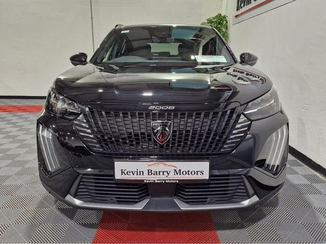 Image for 2024 Peugeot 2008 EV GT (50KWH BATTERY) AUTOMATIC **ONE OWNER / TOP SPEC / APPLE CARPLAY / CRUISE CONTROL / HALF LEATHER / KEYLESS ENTRY / REVERSE CAMERA / WIRELESS PHONE CHARGING / PEUGEOT WARRANTY 03|2027**