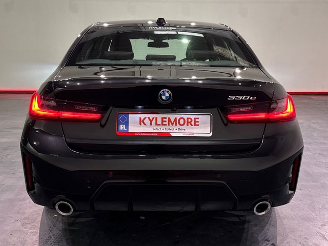 Image for 2025 BMW 3 Series 330E BLACK SAPPHIRE M SPORT SALOON – 18’’ FACTORY ALLOYS – M PERFOMANCE TEX – CRUISE CONTROL - HEATED SEATS – DIGITAL DISPLAY – FLAT BOTTOM M SPORT STEERING WHEEL – REAR CAMERA/PARKING
