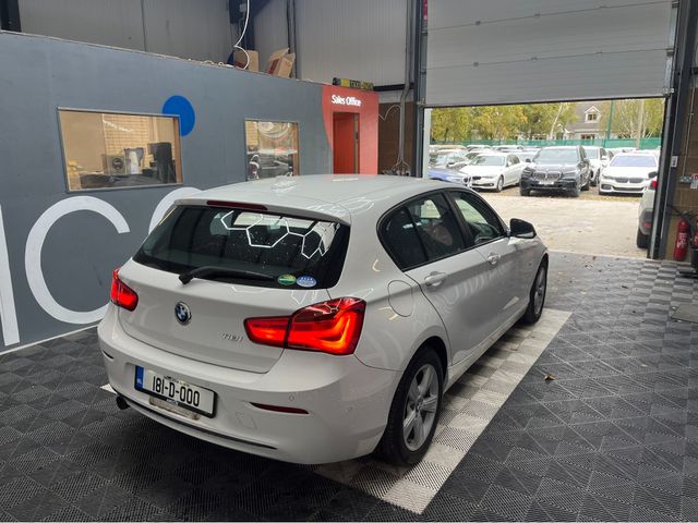 Image for 2018 BMW 1 Series €18950 2018 BMW 1 SERIES AUTOMATIC 118I 1.5L PETROL / 71K KMS / ADAPTIVE CRUISE CONTROL, HEATED SEATS, REVERSE CAMERA & MORE