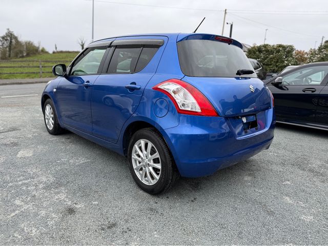 Image for 2016 Suzuki Swift 1.2 XG PETROL 5 SPEED MANUAL // BOOST BLUE PEARL METALLIC // LANE ASSIST // PRIVACY PACK // COLLISION BRAKING ASSIST // REVERSING CAMERA // UPGRADED SPORT ALLOYS // AA DEALER APPROVED 2026