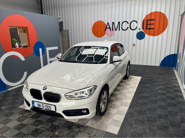 Image for 2018 BMW 1 Series €18950 2018 BMW 1 SERIES AUTOMATIC 118I 1.5L PETROL / 71K KMS / ADAPTIVE CRUISE CONTROL, HEATED SEATS, REVERSE CAMERA & MORE