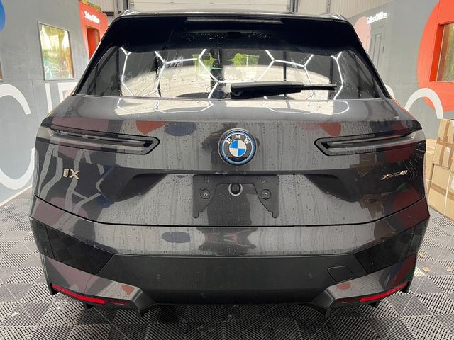 Image for 2023 BMW iX 2023 BMW IX XDRIVE40 LAUNCH EDITION AUTOMATIC / CRUISE CONTROL / PARKING CAMERA / ELECTRIC MEMORY & HEATED SEATS / PANORAMIC SUNROOF / HEATED STEERING WHEEL / APPLE CARPLAY / AMBIENT LIGHTS AND MORE