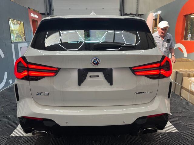 Image for 2022 BMW X3 2022 BMW X3 XDRIVE30E 2.0 AUTOMATIC / CRUISE CONTROL / PARKING CAMERA / ELECTRIC MEMORY & HEATED SEATS / AMBIENT LIGHTS / PANORAMIC SUNROOF AND MORE
