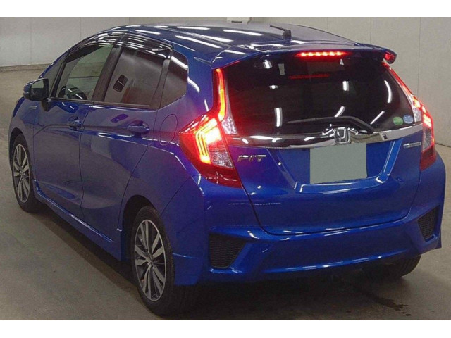 Image for 2014 Honda Fit Honda Fit Hybrid JDM 5-door hatchback with Honda’s efficient 1.5 petrol-hybrid system.