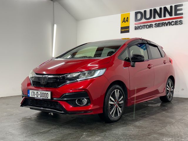 Image for 2017 Honda Fit **'S' PACKAGE**AUTO**HYBRID**KEYLESS ENTRY AND START**HONDA SENSING TECH**LED HEADLAMPS**16" MULTI SPOKE ALLOYS**SPORTS SEATS**APPLE/ANDROID CARPLAY**TOUCHSCREEN MEDIA**REVERSE CAMERA**FACTORY TINT**