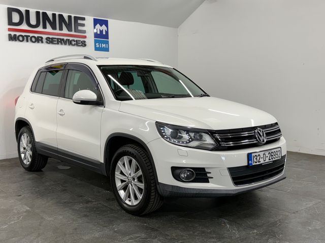 Image for 2013 Volkswagen Tiguan **TOUCHSCREEN BLUETOOTH RADIO **REVERSING CAMERA **REVERSING SENSORS **AUTO START STOP **ELECTRIC HANDBRAKE **AUTO HOLD **AUTO HEADLIGHTS **DUAL CLIMATE CONTROL **FACTORY WIND DEFLECTORS **POWER FOLD