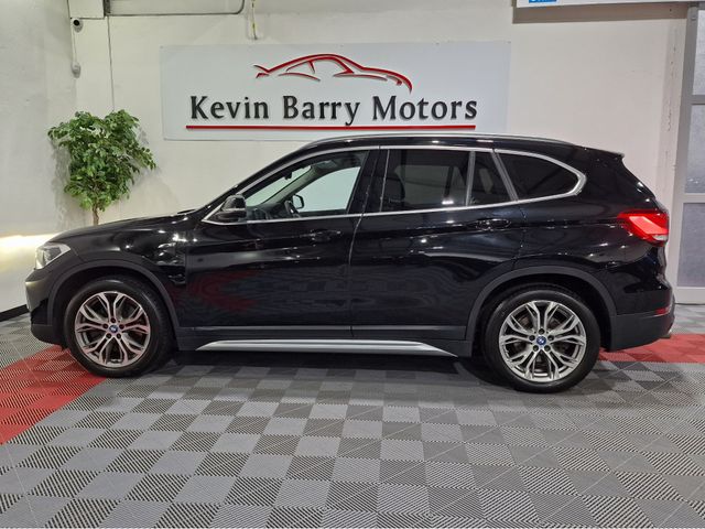 Image for 2022 BMW X1 25E X-LINE (PLUG IN HYBRID) X-DRIVE AUTOMATIC **ONE OWNER / APPLE CARPLAY / CRUISE CONTROL / ELECTRIC BOOTLID / FRONT & REAR PARKING ASSIST / FULL BLACK LEATHER / HEATED FRONT SEATS / SAT NAV**